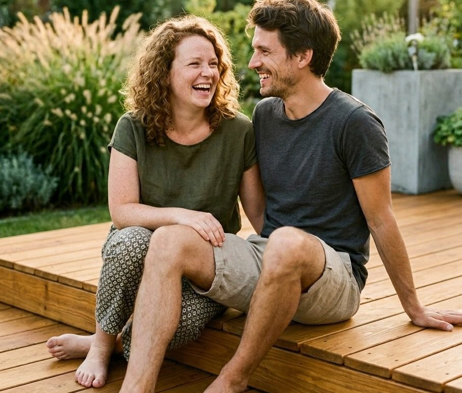 Smiling couple sitting on a wooden deck – example of AI product integration into a lifestyle scene.